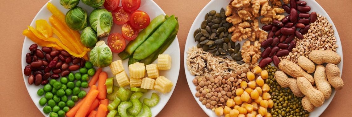 A vibrant flatlay of colorful vegetables and nuts showcasing a balanced diet concept.